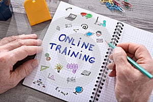 Online training concept on a notepad