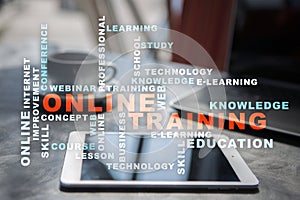 Online training on the virtual screen. Education concept. Words cloud.