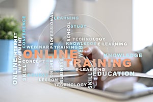 Online training on the virtual screen. Education concept. Words cloud.