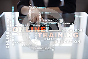 Online training on the virtual screen. Education concept. Words cloud.