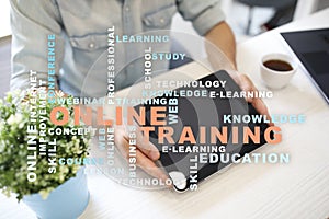 Online training on the virtual screen. Education concept. Words cloud.