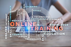 Online training on the virtual screen. Education concept. Words cloud.