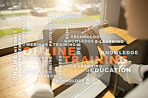 Online training on the virtual screen. Education concept. Words cloud.