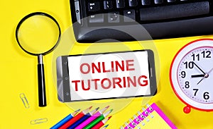 Online tutoring. The inscription of text on the screen of the smartphone.