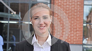 Online Video Chat by Businesswoman Walking Ouside Office