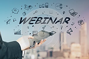 Online video training with man using digital tablet