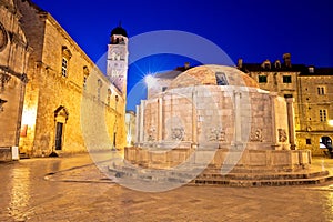 Onofrio Fountain and Stradun street in Dubrovnik evening view