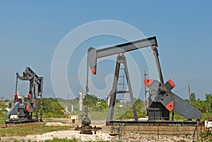 Onshore oil field with wells (nodding donkeys)