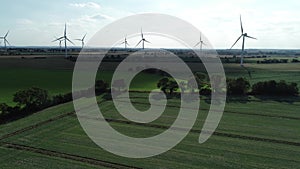 Onshore wind farm green fields, 4k
