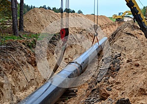 Ð¡onstructing pipelines that transport oil, gas, petroleum products and industrial gases. Dug trench in the ground for
