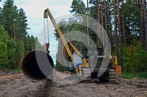 Ð¡onstructing pipelines that transport oil, gas, petroleum products and industrial gases. Dug trench in the ground for