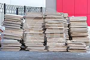 Ð¡onstruction site has many garbage. Pile of construction waste near a multistorey residential building