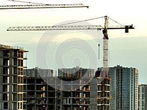 Ð¡onstruction site with tower cranes on building construction.