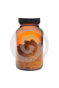 ÃÂ¡ontainer with pills closeup on a white background