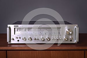 Ontario/Canada - Dec 13 2019: Vintage Stereo Receiver Audio Reflex standing on the Wooden Sideboard