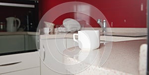 ÃÂ¡ontemporary kitchen table with a white coffee cup