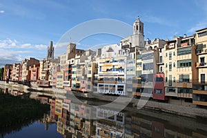 Onyar River crossing Girona with its typical colored houses photo