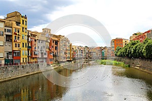 Onyar River in Girona, Spain, and colorful houses of the Old Tow
