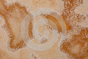 Onyx Miele background, natural texture in warm color for design work. photo