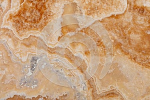 Onyx Miele background, natural texture in warm tone. Slab photo. photo