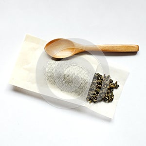 Oolong tea, spoon and tea bag