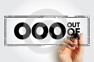 OOO Out Of Office - used in professional contexts to indicate that someone is unavailable for work, acronym text concept stamp photo