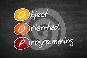 OOP Object Oriented Programming, acronym business concept on blackboard