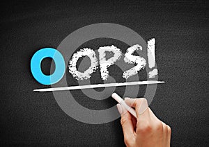 Oops! text on blackboard