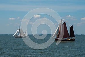 Oosterleek, Netherlands, May 2022. Old traditional sailing ships on the Markermeer, Netherlands.