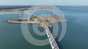The Oosterscheldekering is a flood defense system in the Netherlands , part of the Delta Works ,in the provinces of