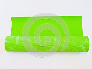 Op view green  yoga mat sport isolated.Rolled up yoga mat isolated on white. Copyspace.