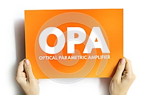 OPA - Optical Parametric Amplifier acronym on card, abbreviation concept background