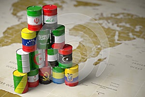 OPEC concept. Oil barrels in color of flags of countries memebers of OPEC on world political map background