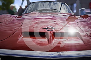Opel GT classic sports car from German production, front view of red painted car