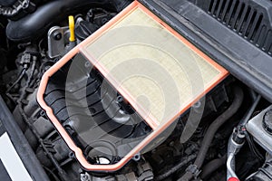 Open air box with new filter in car engine bay