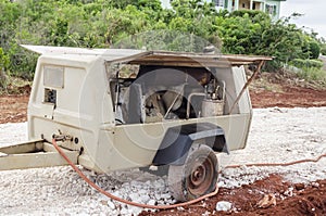 Air Compressor On Road Construction Site