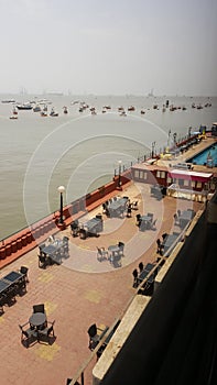 Open air Dining setup at sea front cafe photo