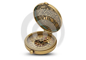 Open antique brass compass with a decorative, engraved lid