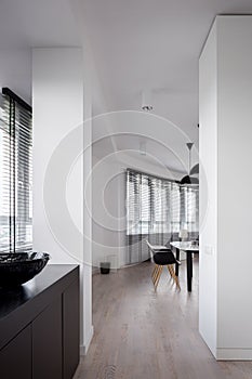 Open apartment with curved wall