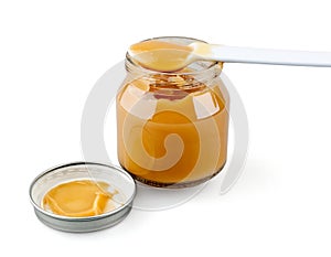 Open baby puree with spoon