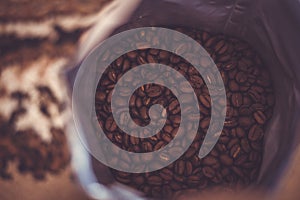 An open bag of coffee beans