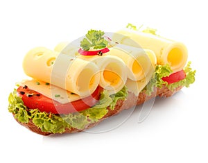 Open baguette sandwich with rolled cheese