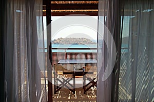 Open balcony with furniture and sea view(Greece) photo