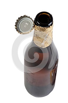 Open beer bottle with cover