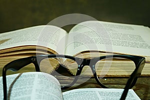 Open Bible with Glasses