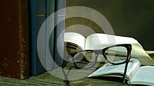 Open Bible with Glasses