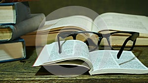 Open Bible with Glasses