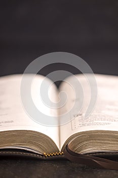 Open Bible on a Slate Tabletop