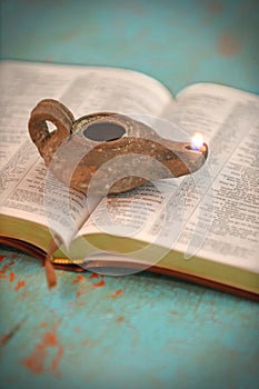 Open Bible and Vintage Lamp