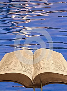 Open bible water ripples